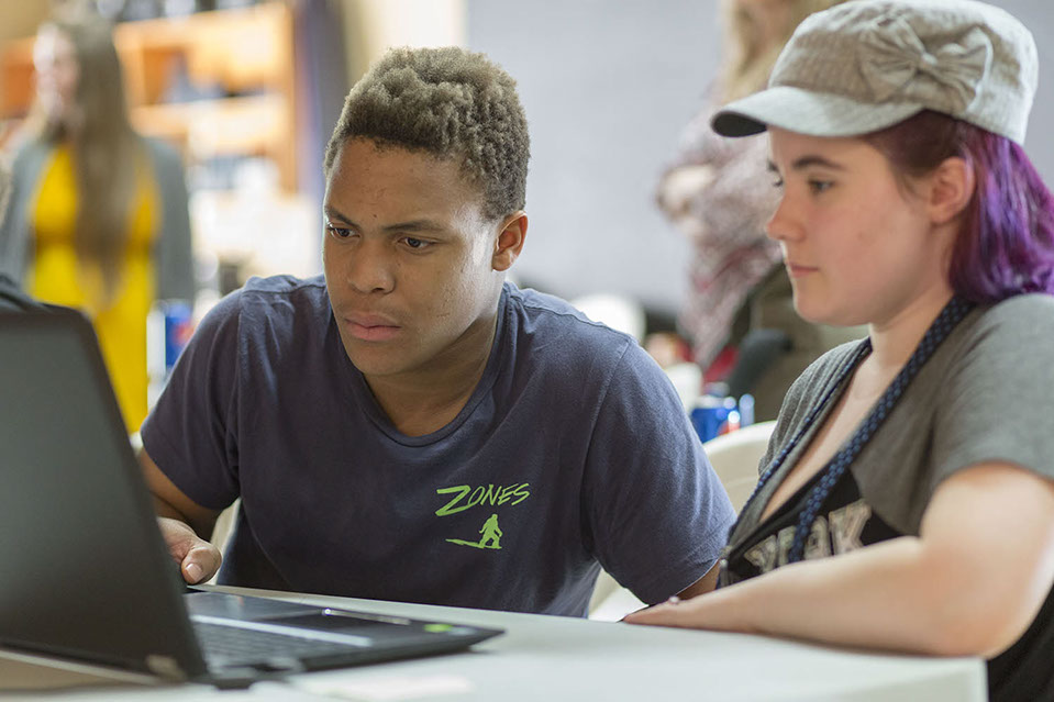 teens working on a computer